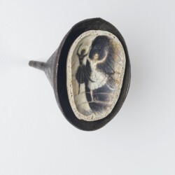 Lucy, 2016 Oil and beeswax on skull, funnel; metal 19,5 x 17 cm