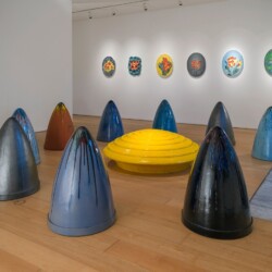What a Shine, 1999-2001, Installation (consisting of one disc, 9 cones, 6 medallions and 5 watercolours) Glazed ceramic, watercolours on hand-made paper Variable dimensions