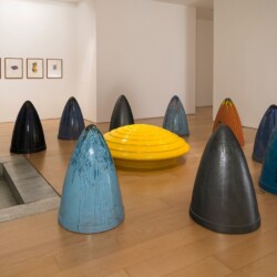 What a Shine, 1999-2001, Installation (consisting of one disc, 9 cones, 6 medallions and 5 watercolours) Glazed ceramic, watercolours on hand-made paper Variable dimensions