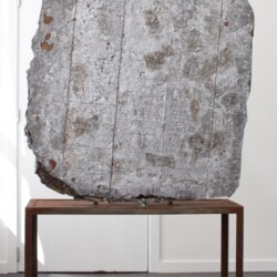 "Eclipse 1", 2018, Sculpture with brick, wood, concrete and lead Work: 110 x 94 x 24 cm Pedestal: 61 x 90 x 40 cm