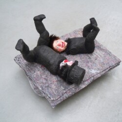 Mes Transports, 2012-13, Various objects, wood, metal, wheels, blankets, black wrap, 55 x 83 x 45 cm