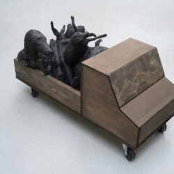 Mes Transports, 2012-13, Various objects, wood, metal, wheels, black wrap, 37 x 82 x 45 cm