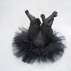 Mes Transports, 2012-13, Tutu, various objects, wood, metal, wheels, black wrap, 47 x 70 x 60 cm